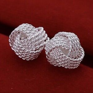 Silver plated woman’s design earrings